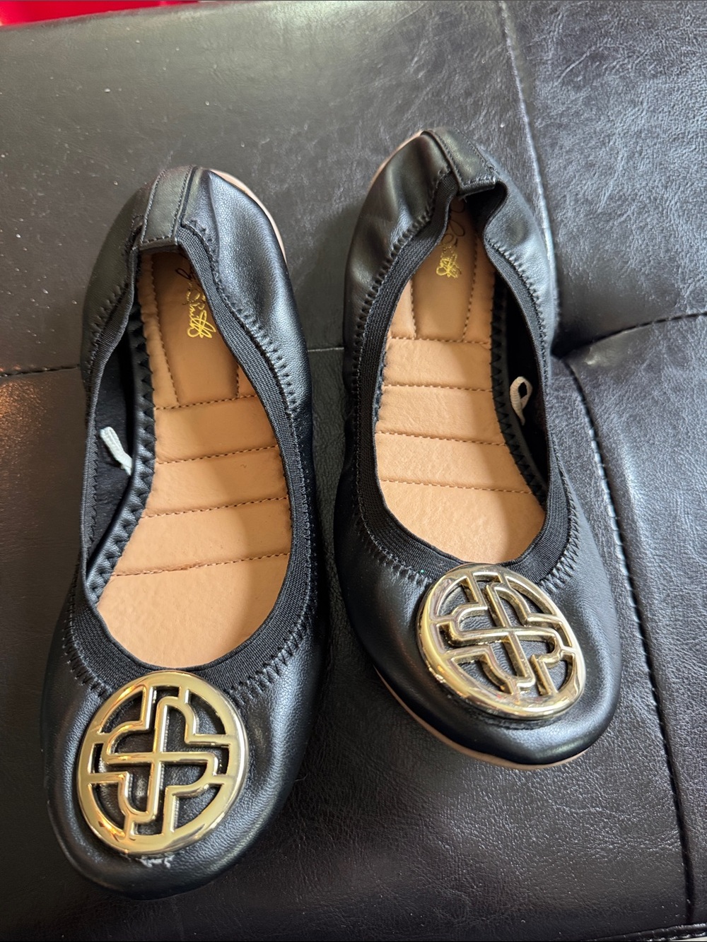 Jellypop Black Ballet Flats with Gold Medallion